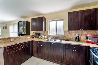 1371 NW 59th St, Miami, FL 33142 - Photo 10