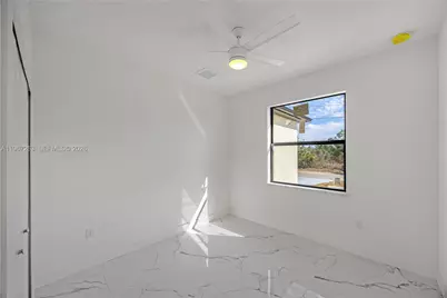 809 Vance Ave E, Lehigh Acres, FL 33974 - Photo 8