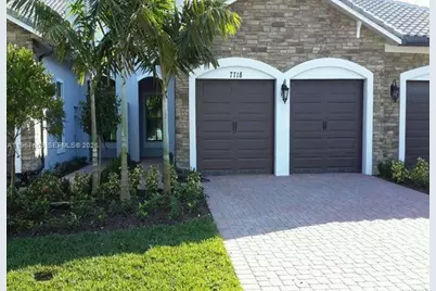 7718 N Blue Spring Dr, Parkland, FL 33067 - Photo 1