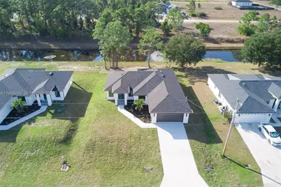 1136 Helen Ave S, Lehigh Acres, FL 33974 - Photo 26