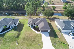 1136 Helen Ave S, Lehigh Acres, FL 33974 - Photo 26