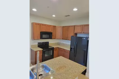 2851 W Prospect Rd #405, Tamarac, FL 33309 - Photo 6