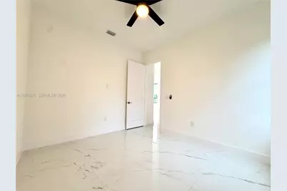 904 Asher St E, Lehigh Acres, FL 33974 - Photo 16