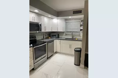 40 NW 87th Ave #D211, Miami, FL 33172 - Photo 2