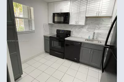 8390 Sands Point Blvd #107F, Tamarac, FL 33321 - Photo 2