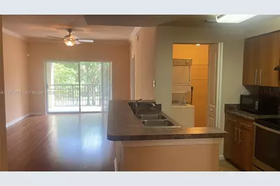 6020 W Sample Rd #207, Coral Springs, FL 33067 - Photo 8