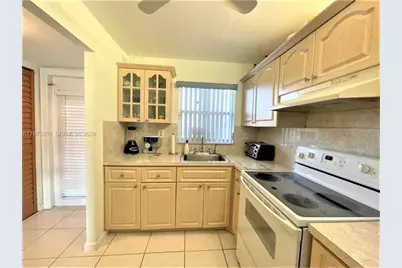 9900 Sunrise Lakes Blvd #210, Sunrise, FL 33322 - Photo 4