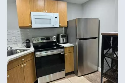 4275 NW South Tamiami Canal Dr #2-205, Miami, FL 33126 - Photo 1