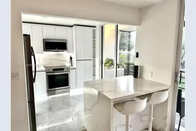 671 NE 195th St #205E, Miami, FL 33179 - Photo 2
