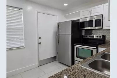 1351 NE 191st St #E420, Miami, FL 33179 - Photo 16