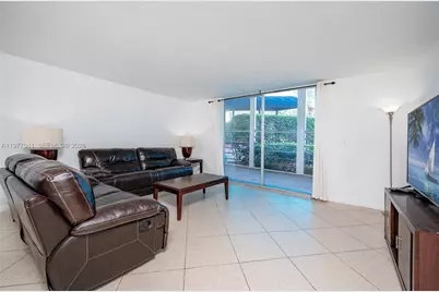 100 Golden Isles Dr #104, Hallandale Beach, FL 33009 - Photo 8