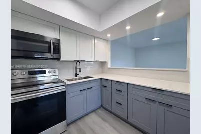 455 Golden Isles Dr #203, Hallandale Beach, FL 33009 - Photo 2