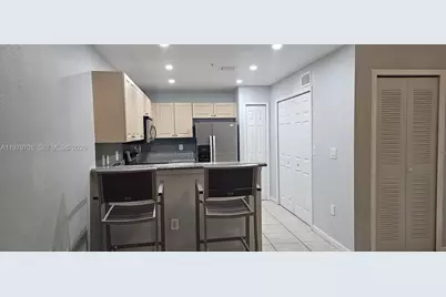 11002 NW 83rd St #210, Doral, FL 33178 - Photo 1
