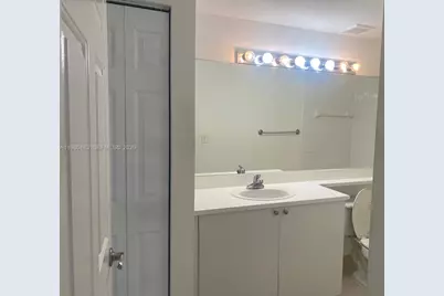 7980 N Nob Hill Rd #107, Tamarac, FL 33321 - Photo 8