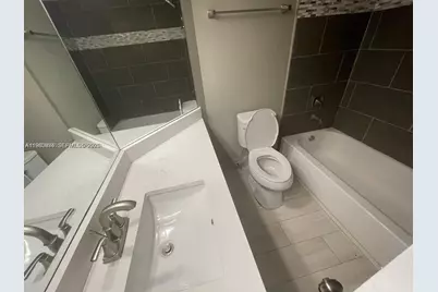 2811 N Oakland Forest Dr #110, Oakland Park, FL 33309 - Photo 8