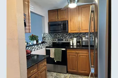 9900 Sunrise Lakes Blvd #107, Sunrise, FL 33322 - Photo 4