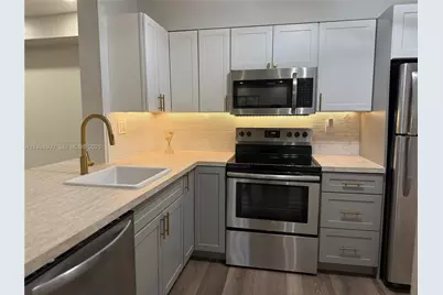 3001 N Oakland Forest Dr #104, Oakland Park, FL 33309 - Photo 2