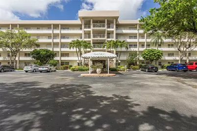 3970 Oaks Clubhouse Dr #407, Pompano Beach, FL 33069 - Photo 1