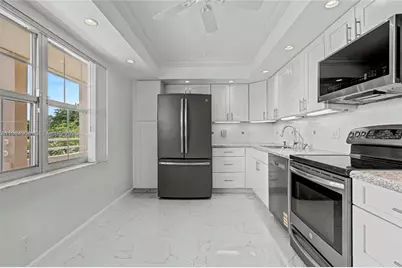 3970 Oaks Clubhouse Dr #407, Pompano Beach, FL 33069 - Photo 14