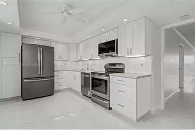 3970 Oaks Clubhouse Dr #407, Pompano Beach, FL 33069 - Photo 16