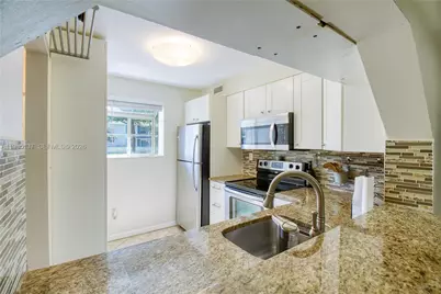 3095 N Oakland Forest Dr #104, Oakland Park, FL 33309 - Photo 12