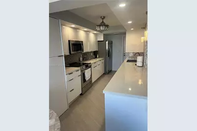 100 Golden Isles Dr #205, Hallandale Beach, FL 33009 - Photo 10