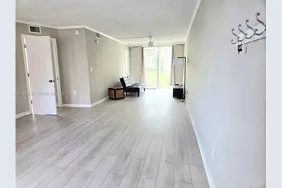 1700 NE 191st St #100, Miami, FL 33179 - Photo 6