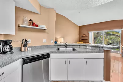 771 N Pine Island Rd #303, Plantation, FL 33324 - Photo 12