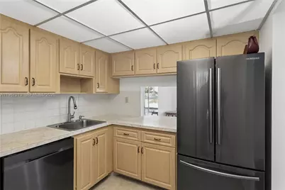 7887 Golf Circle Dr #203M, Margate, FL 33063 - Photo 10