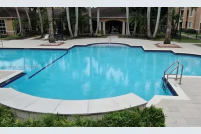 8000 N Nob Hill Rd #107, Tamarac, FL 33321 - Photo 2