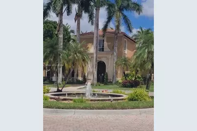 8000 N Nob Hill Rd #107, Tamarac, FL 33321 - Photo 14