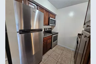 5686 Rock Island Rd #126, Tamarac, FL 33319 - Photo 6