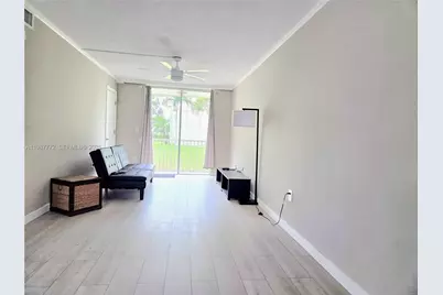 1700 NE 191st St #100, Miami, FL 33179 - Photo 6