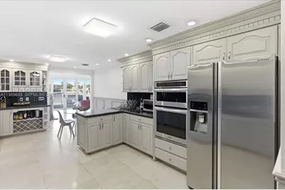 1249 Biscaya Dr, Surfside, FL 33154 - Photo 22