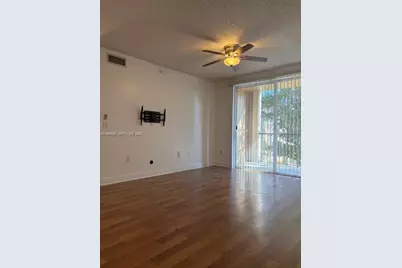 8000 N Nob Hill Rd #206, Tamarac, FL 33321 - Photo 12