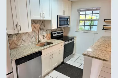 125 NW 25th St #129, Wilton Manors, FL 33311 - Photo 4