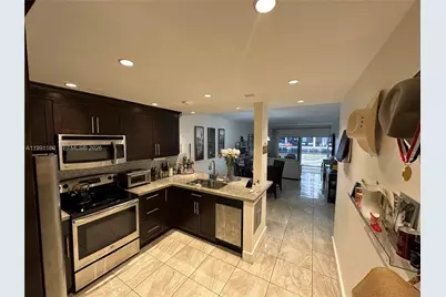 450 Paradise Isle Blvd #102, Hallandale Beach, FL 33009 - Photo 1