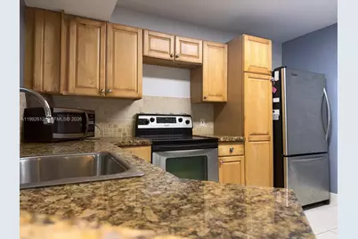 8901 Wiles Rd #103, Coral Springs, FL 33067 - Photo 1