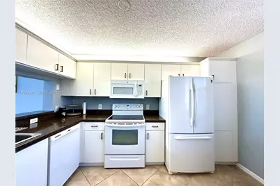10360 NW 30th Ct #303, Sunrise, FL 33322 - Photo 1
