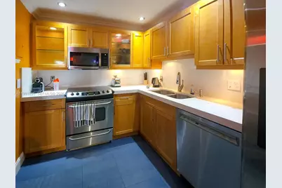 401 Golden Isles Dr #101, Hallandale Beach, FL 33009 - Photo 12
