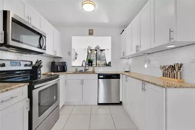 10003 Costa Del Sol Blvd #E-67, Doral, FL 33178 - Photo 10