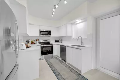 462 Golden Isles Dr #211, Hallandale Beach, FL 33009 - Photo 8