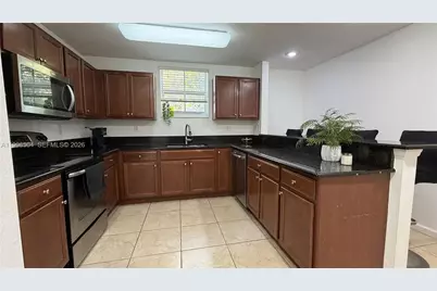 11605 NW 89th St #220, Doral, FL 33178 - Photo 4