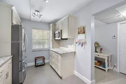 3505 Oaks Way #308, Pompano Beach, FL 33069 - Photo 18