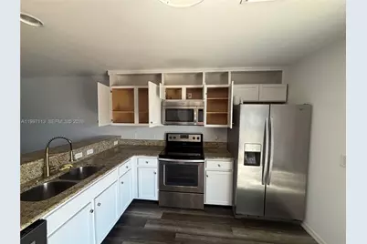 4413 SW 15th Pl, Cape Coral, FL 33914 - Photo 6