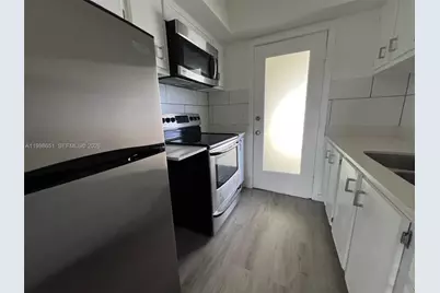 1350 E Sample Rd #306, Pompano Beach, FL 33064 - Photo 1