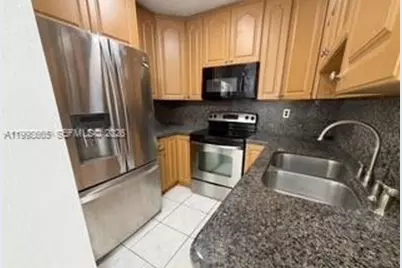 2565 W 56th St #101, Hialeah, FL 33016 - Photo 1