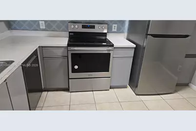 8901 Wiles Rd #303, Coral Springs, FL 33067 - Photo 12
