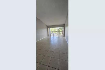 8901 Wiles Rd #303, Coral Springs, FL 33067 - Photo 10