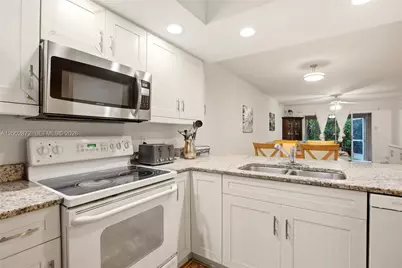 338 Bradstrom Cir #A-104, Naples, FL 34113 - Photo 12